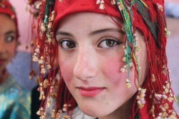 A beautiful young girl looking straight to the camera, showing the natural moroccan beauty secrets